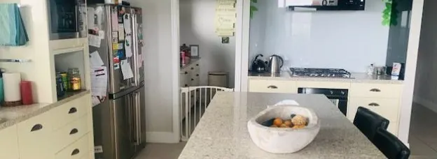 Clear, reset kitchen bench and island after cleaning