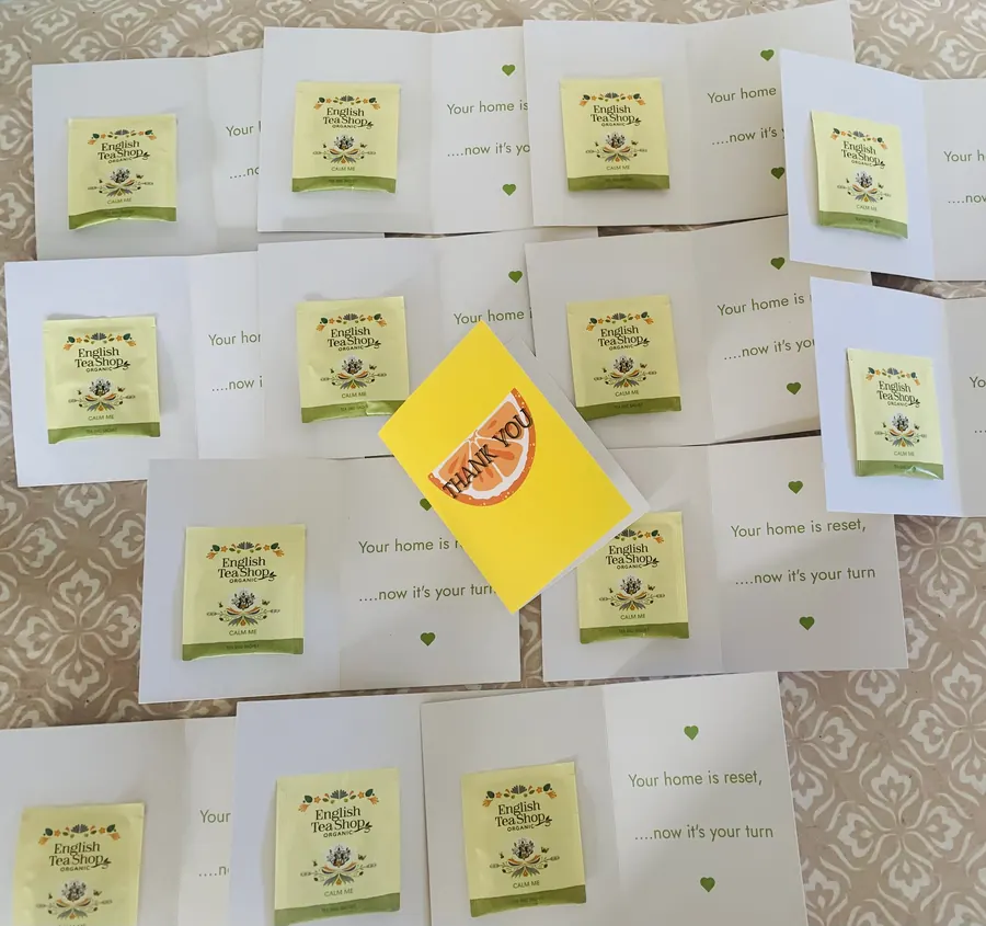 Calming tea sachets left as a thank-you, reading your home is reset, now it's your turn